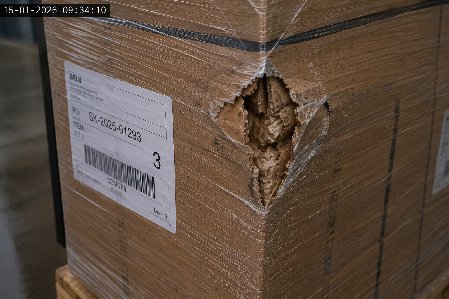 Close-up of damaged packaging on pallet 3
